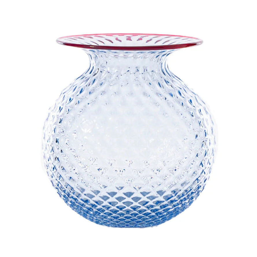 Clear glass vase with a textured design on a white background